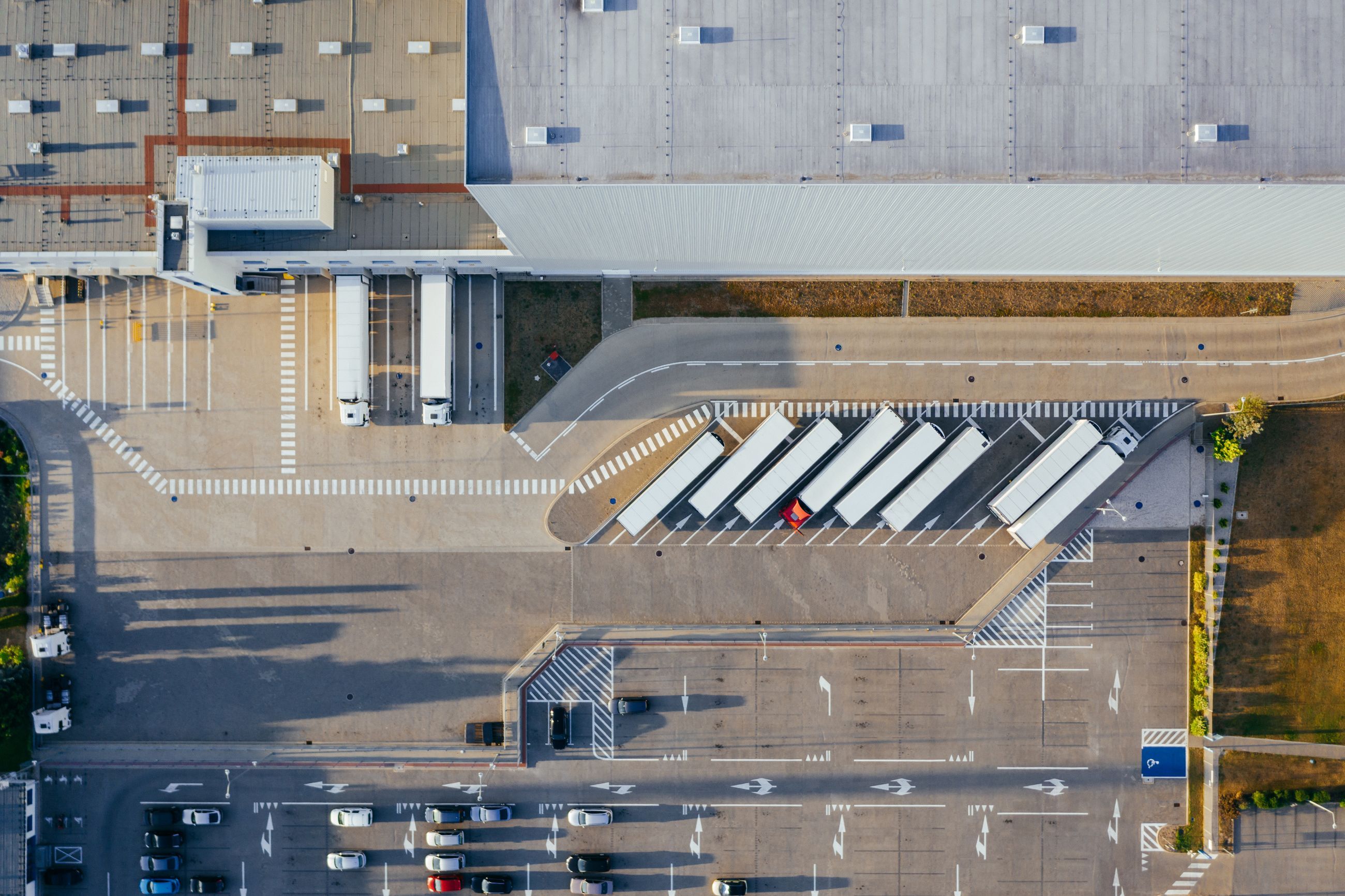 Aerial view of trailers staged in a distribution center yard